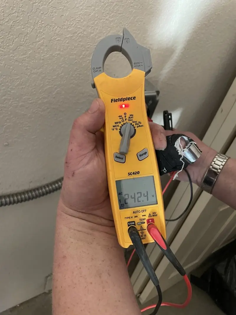 Voltage testing with clamp meter during Generator Installation in Covina